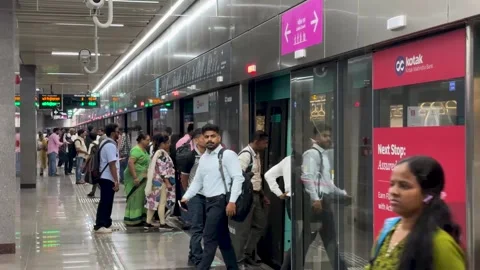 Crowd Boarding Metro Train at Station in India During Peak Hours 4K Stock Footage 347023751
