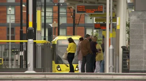 Crowd boards an arriving train Stock Footage 12459905