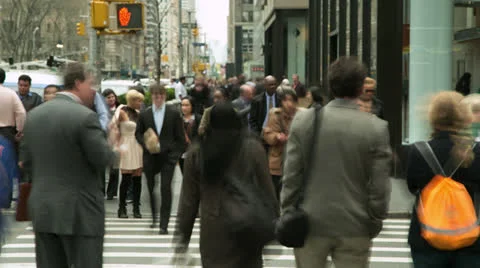 Crowd of business commuter people walking city street timelapse Stock Footage