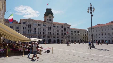 Crowd at Caffè degli Specchi and City Hall in Trieste Stock Footage 259474334