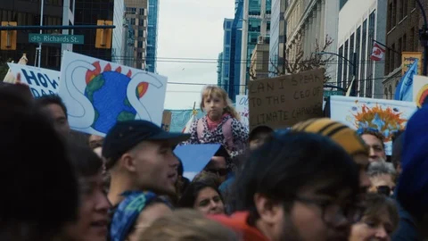 Crowd chanting for for climate action, holding signs. Vancouver, Sept 2019. Video stock 117979848