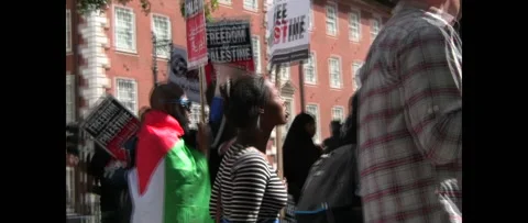 Crowd chanting OCCUPATION NO MORE at huge Gaza Rally London UK Stock Footage 144235848