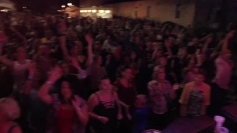 Crowd cheering on a band on stage Stock Footage 141839418