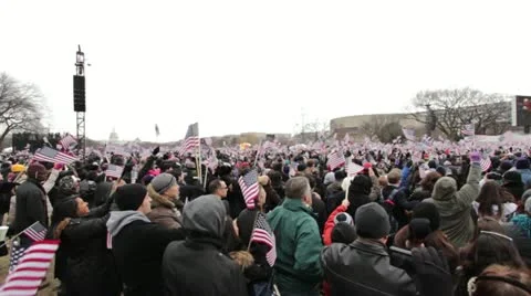 Crowd cheering at inauguration pan shot Stock Footage