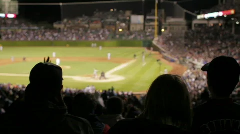Crowd cheers at baseball game, silhouette Stock Footage