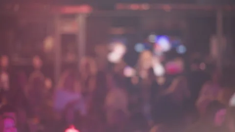 Crowd cheers vividly. Enthusiastic crowd claps loudly amid vibrant stage Stock Footage 334707098