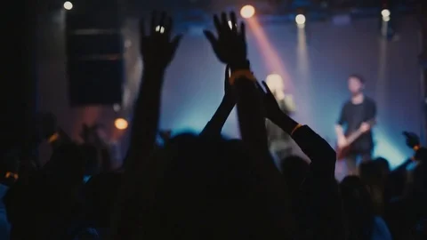 Crowd clapping hands in the night club party Stock Footage 70502965