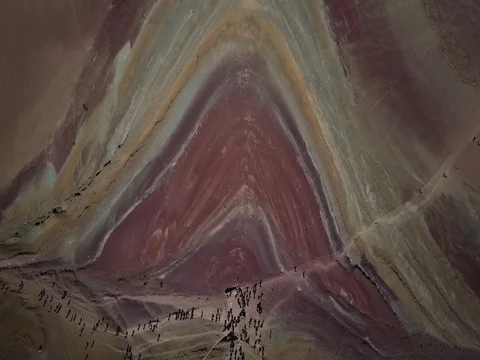 Crowd climbs colored mountain in Peru Stock Footage 83292942
