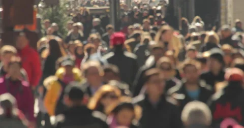 Crowd of commuter people walking street sidewalk anonymous face Stock Footage