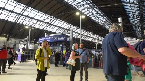 Crowd of Commuters Inside British Railway Station - Queen Street in Glasgow Stock Footage 119145943