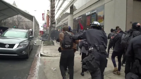Crowd Control Police scatters crowd Stock Footage 72190824