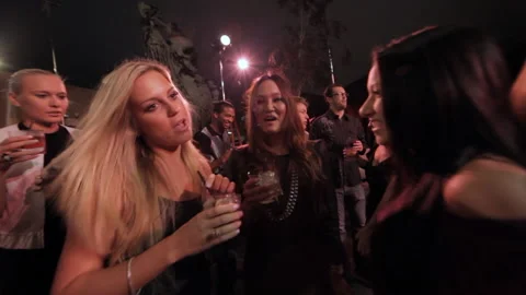 Crowd dancing and drinking at party | Stock Video | Pond5
