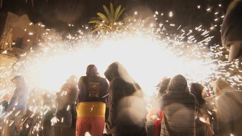 Crowd dancing in the Correfoc fireworks Barcelona Spain Stock Footage 100388555