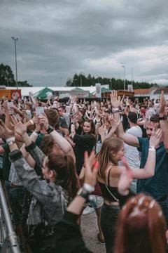 Crowd dancing during the electronic music festival "Electrifinity" in Bad Aiblin 스톡 사진