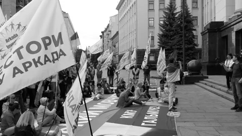 A crowd of demonstrators staged a strike, a theatrical action, a boycott. Stock Footage 135262220