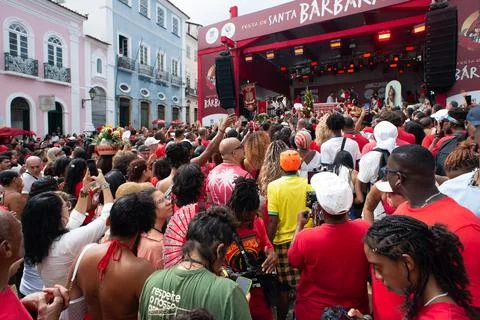 A crowd of devotees is seen in Pelourinho during the Santa Barbara Festival.. Stock Photos