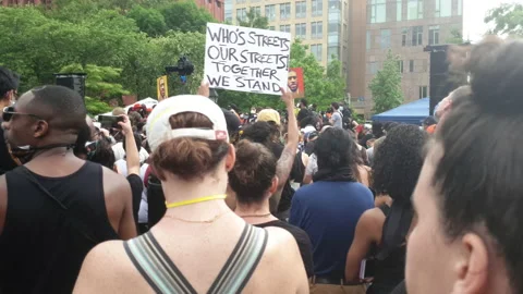 Crowd of Diverse Protesters listen to speeches at a BLM Rally in New York City Stock Footage 132431829
