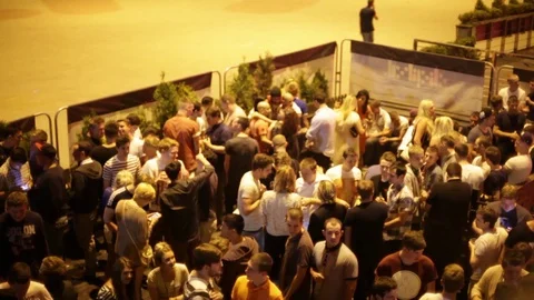 Crowd drinking young people above club nightlife smokers bar pub club  Stock Footage 96419100
