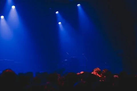 Crowd with empty music stage. Stock Photos