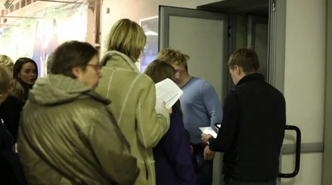 Crowd entering the cinema hall Stock Footage 29668285