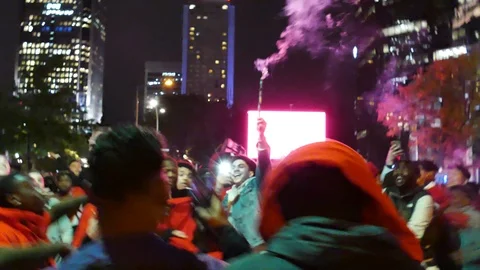 Crowd exploding firework in crowd Stock Footage 114797575