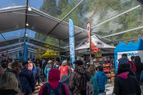 Crowd exploring exhibition booths at event in bariloche argentina Stock Photos