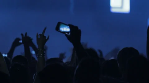 Crowd filming DJ with cellphone Stock Footage 34643272