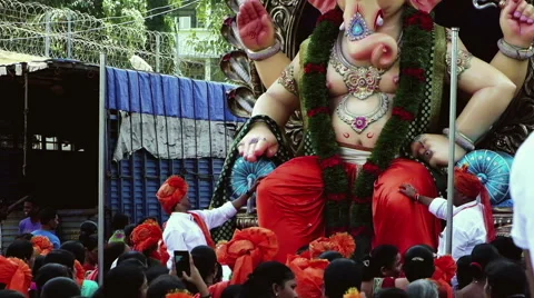 CROWD IN FRONT OF BIG IDOL ON GANESHA CHATURTHI IN MUMBAI [CC-CG, Emulation] Stock Footage 58892843
