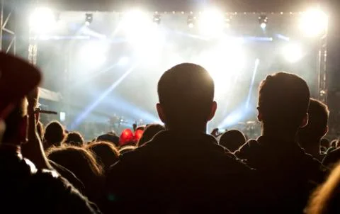Crowd in front of stage lights Stock Photos