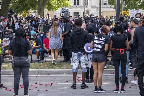 Crowd gathered in a park Stock Photos