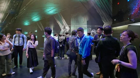 Crowd gathering at illuminated Computex Taipei event area Stock Footage 335479355