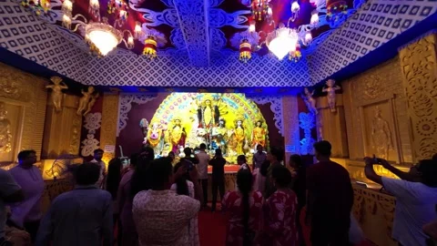 Crowd Gathering at Vibrant Durga Puja Pandal Video stock 318519915