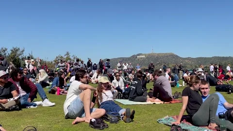 Crowd Gathering to View Solar Eclipse in Hollywood CA at Griffith Observatory Stock Footage 271313005