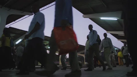 Crowd getting off the train in the evening  Station.DaresSalaam Tanzania Stock Footage 132239019