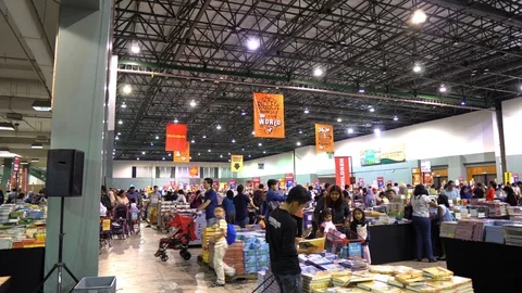 Crowd going through books at The Big Bad Wolf Book Sale 2018 at the Malaysia Stock Footage 99532653