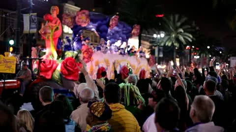 Crowd in Hermes parade screaming for beads Stockbeeldmateriaal 10820468