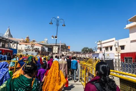 Crowd of Hindu Devotees walking towards Ram Temple Complex on Sunny Day in .. Stock Photos