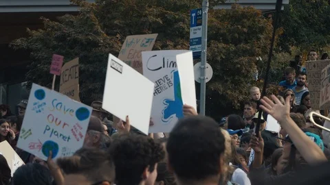 Crowd holdding climate change protest signs. Vancouver, September 2019. Stock Footage 117962849