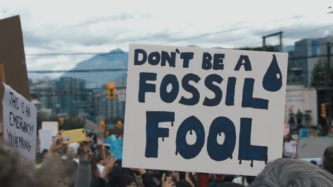 Crowd holding climate action protest signs. Vancouver, Sept2019. Stock Footage 117961696