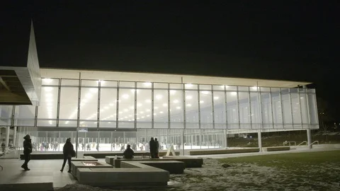 Crowd ice-skating inside the ice skating club Stock Footage 86375014