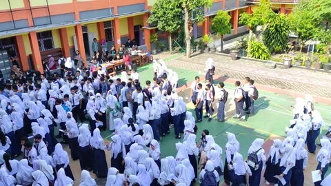 A crowd of junior high school students in Java, Indonesia Stock Footage 244298253