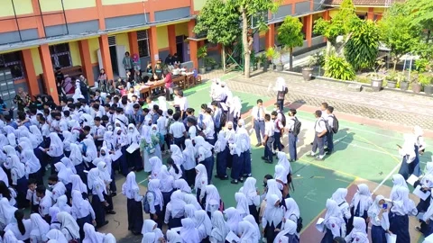 A crowd of junior high school students in Java, Indonesia Stock Footage 244298254