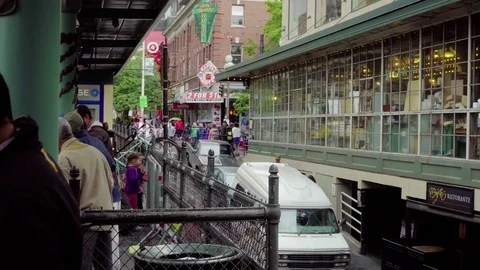 Crowd leans against railing in Pikes Place Seattle Stock Footage 73503291
