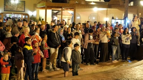 Crowd in a Lighted Courtyard Stock Footage 88003558