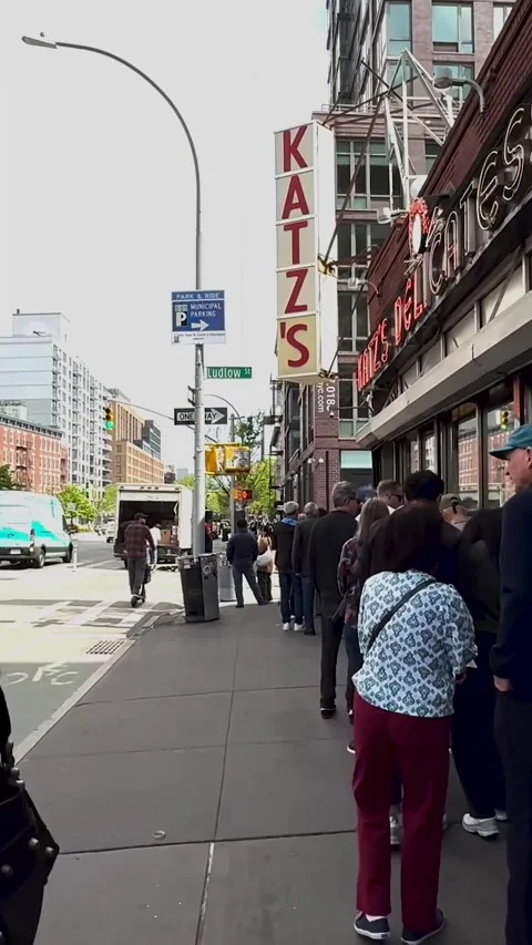 Crowd Line at Famous Katz Store in America Vertical Footage Stock Footage 334936395