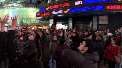Crowd Looking up Celebrating after 2012 Election Night Stock Footage 59259215
