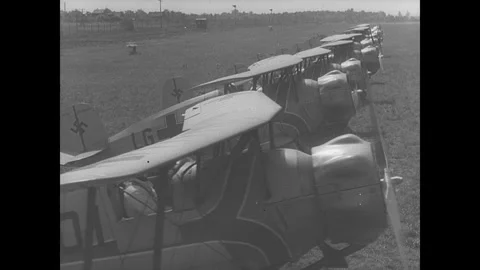Crowd looks on during aircraft demonstration Germany 1930s Stock Footage 252520853
