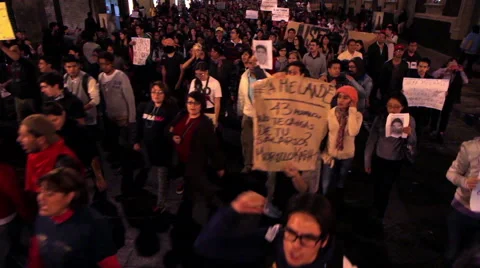 Crowd in a march protest for the 43 students disappeared in Ayotzinapa Guerrero. Stock Footage 44212126