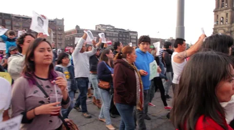 Crowd in a march protest for the 43 students disappeared in Ayotzinapa Guerrero. Stock Footage 44352764
