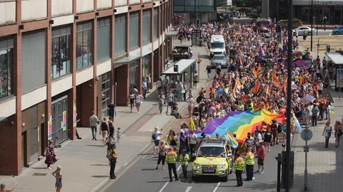 Crowd Marching, Bristol Pride Parade with LGBT Rainbow Flag Video stock 92334131